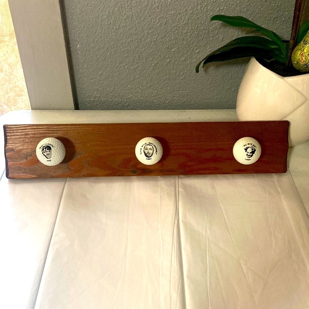 Three Stooges golf ball hanging rack